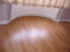 curved beading under radiator with laminate flooring